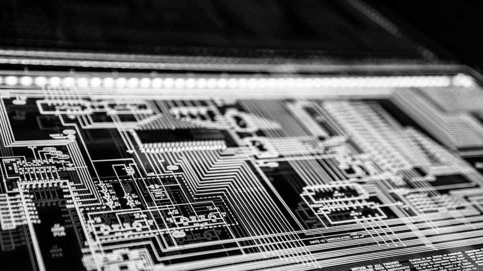 Wide close-up of an illuminated circuit board