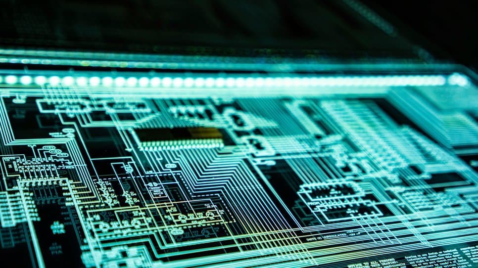 Wide close-up of an illuminated circuit board